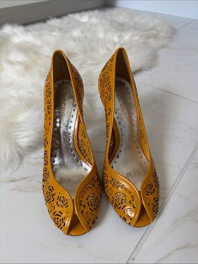 BCBGirls Mustard Yellow Laser-Cut Peep-Toe Heels
